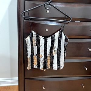 Top black white and gold.